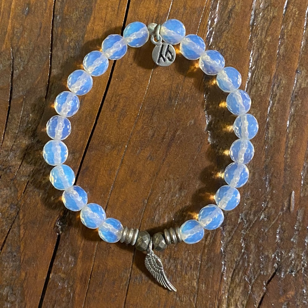 T. Jazelle Bracelet- White Opal with Angel Wing